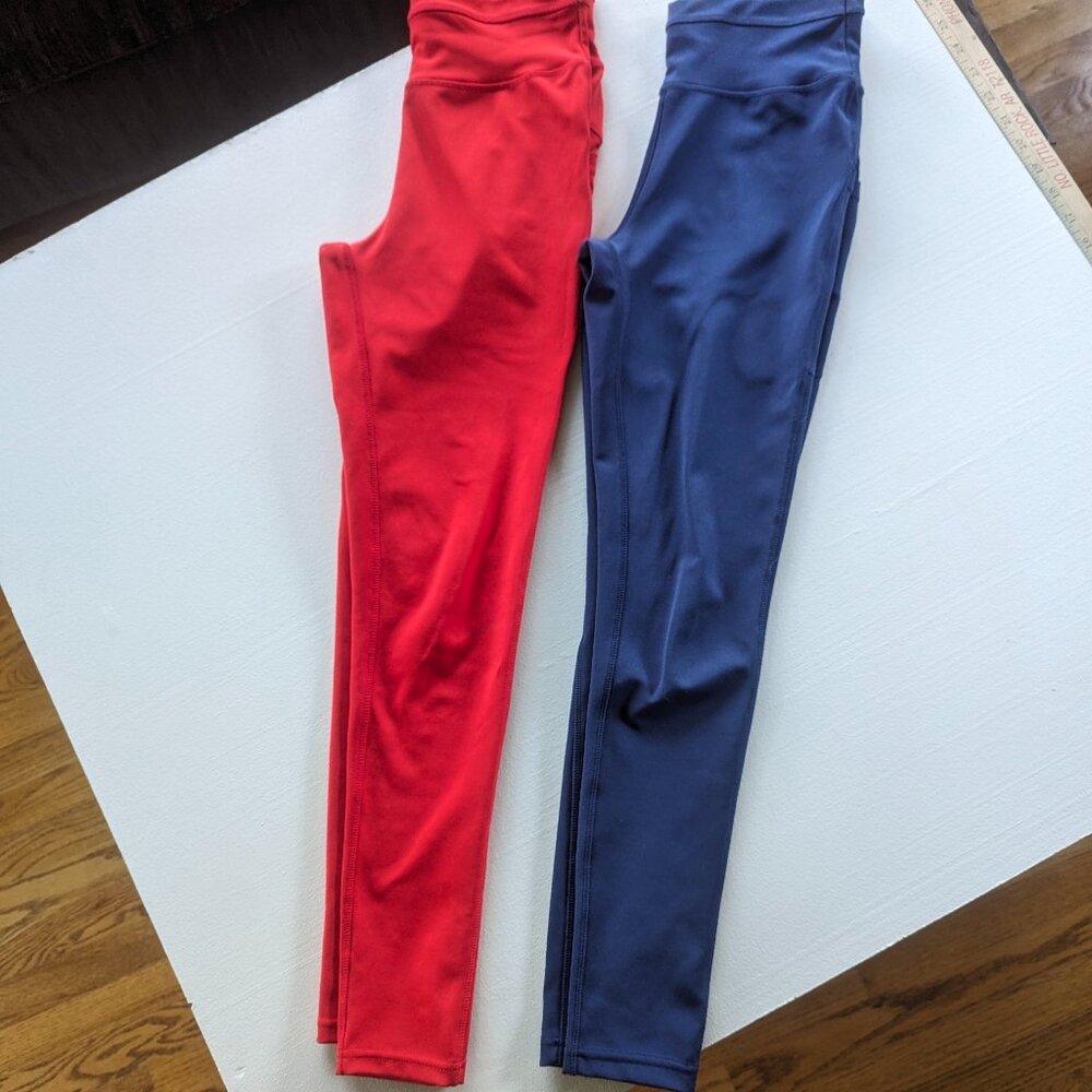 Two pair of Popfit leggings, XS, red and blue